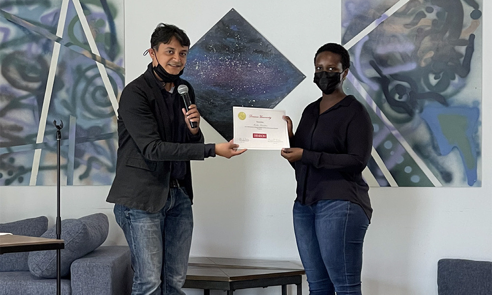 Sangeet Kumar presents certificate to Fellow, Martha Kamikazi