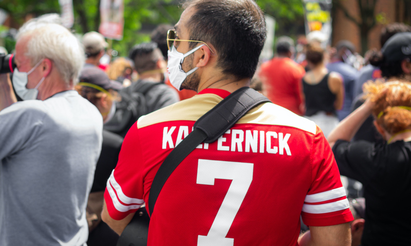 Man wearing Colin Kaepernick football jersey