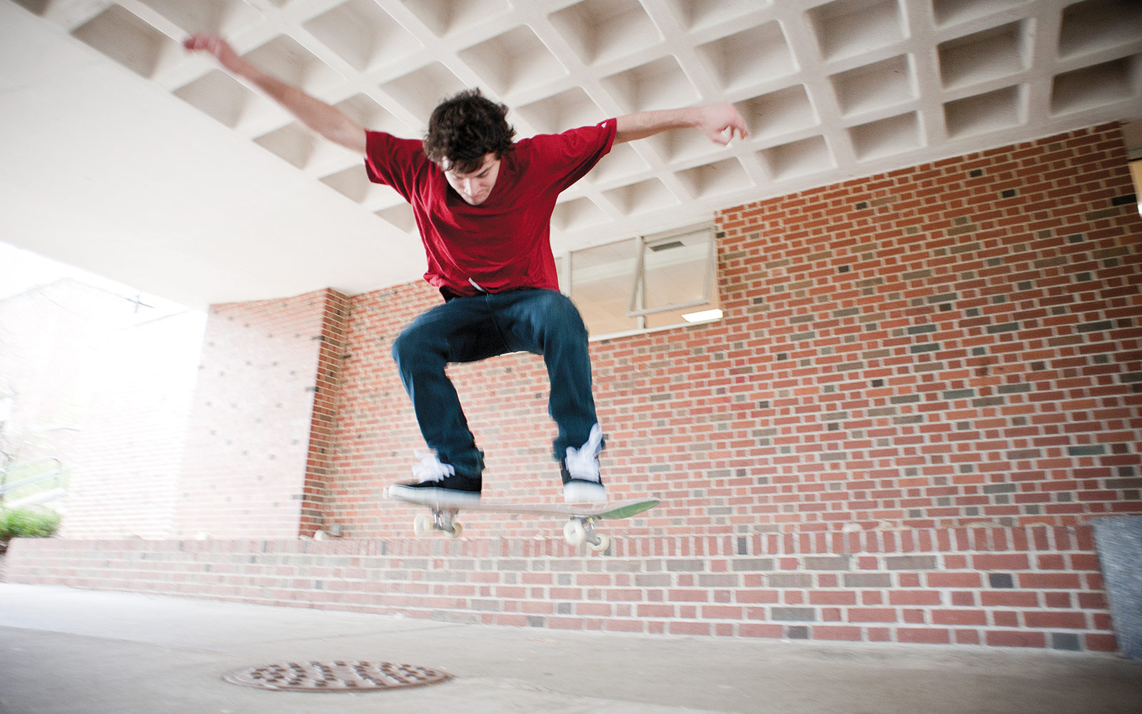 We were going into the dining hall to talk photographs when we saw this skateboarder. I must have taken more than 100 pictures of him doing this stunt over and over and over again. I think I said, "One more time! One more time!" about 12 ti…