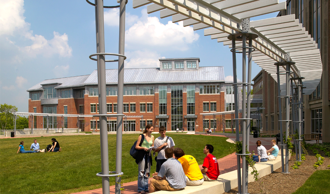 Photo of students with Burton D. Morgan Center in the background 