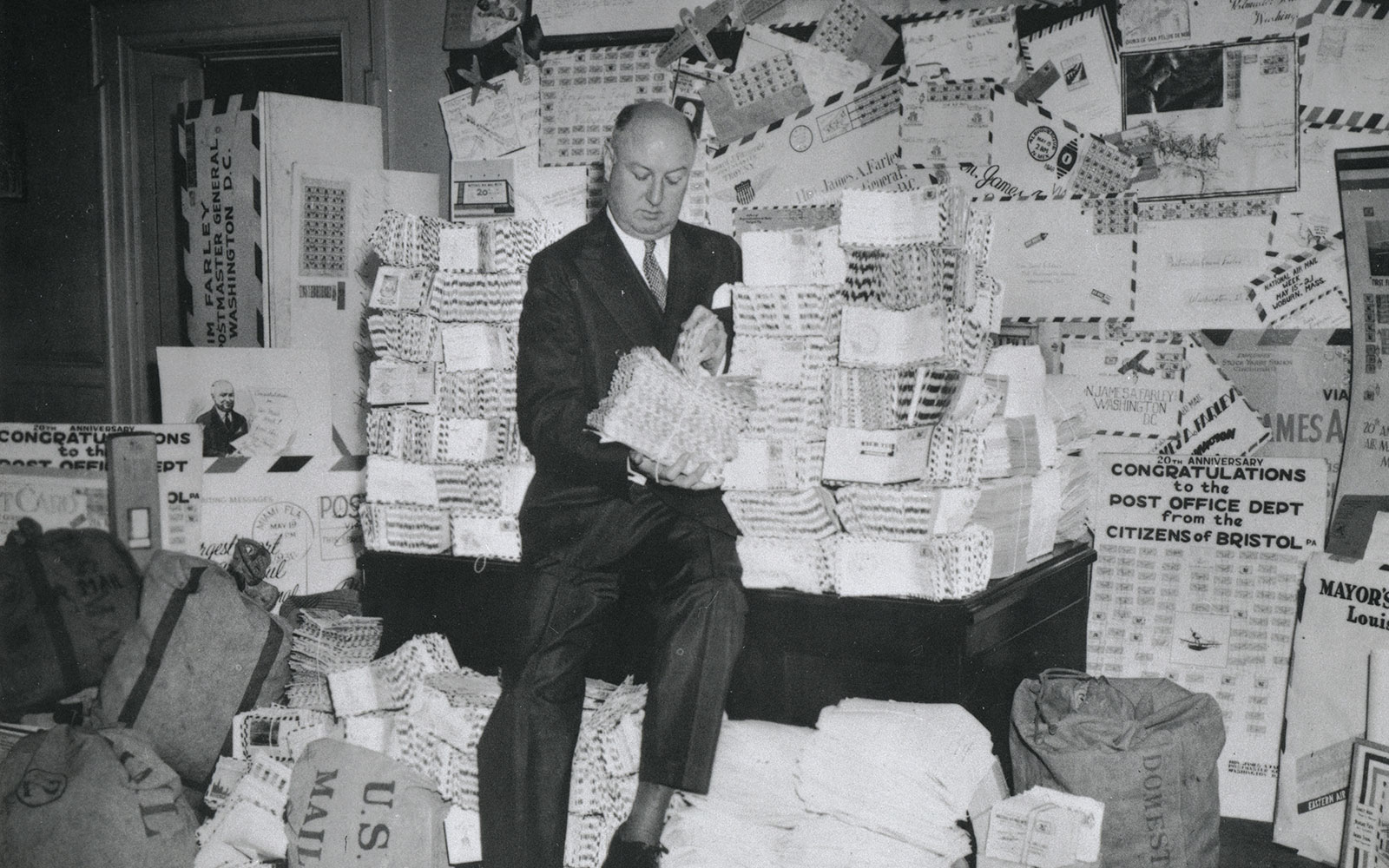 In May of 1938, hundreds of letters were mailed during National Air Mail Week - a campaign in which the USPS encouraged folks to send air mail to celebrate 20 years of "flying letters" in the United States. Here, Postmaster General James A.…