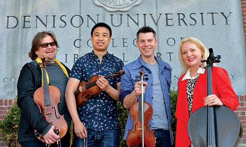 Photo of four people from ETHEL, Denison’s ensemble-in-residence