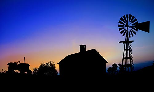 Photo of a sustainable energy source in a rural setting