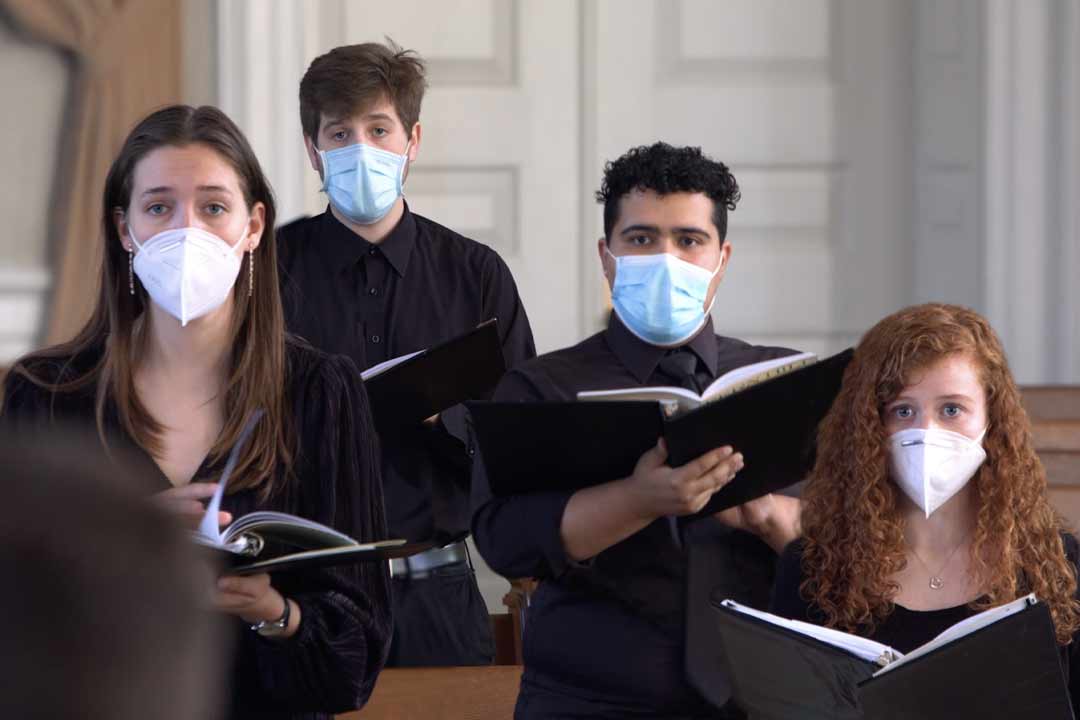 Denison Chamber Singers singing with face masks