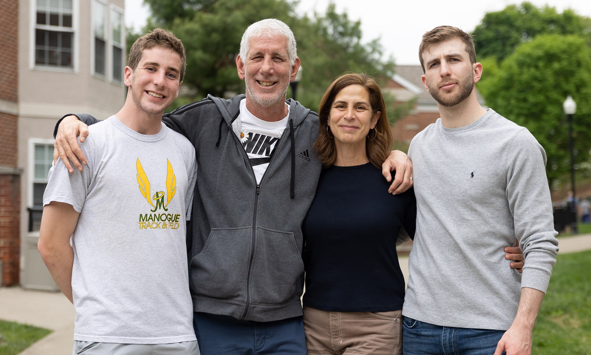 Tom and Stephanie Levin, flanked by their sons, Will (left) and Jack (right)