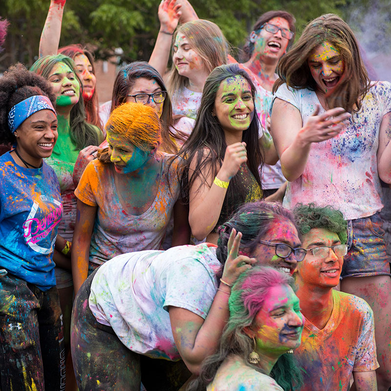 Students covered in powdered paint