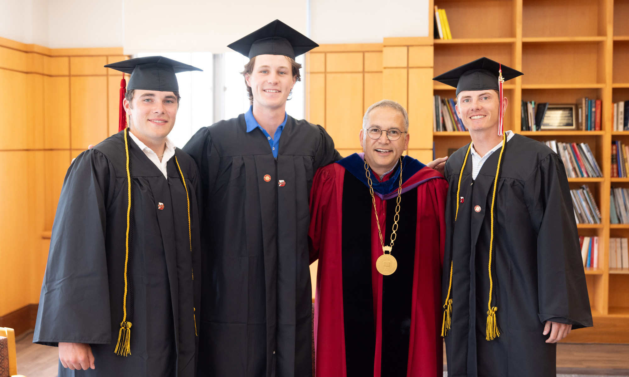 Students pose with President Weinberg.