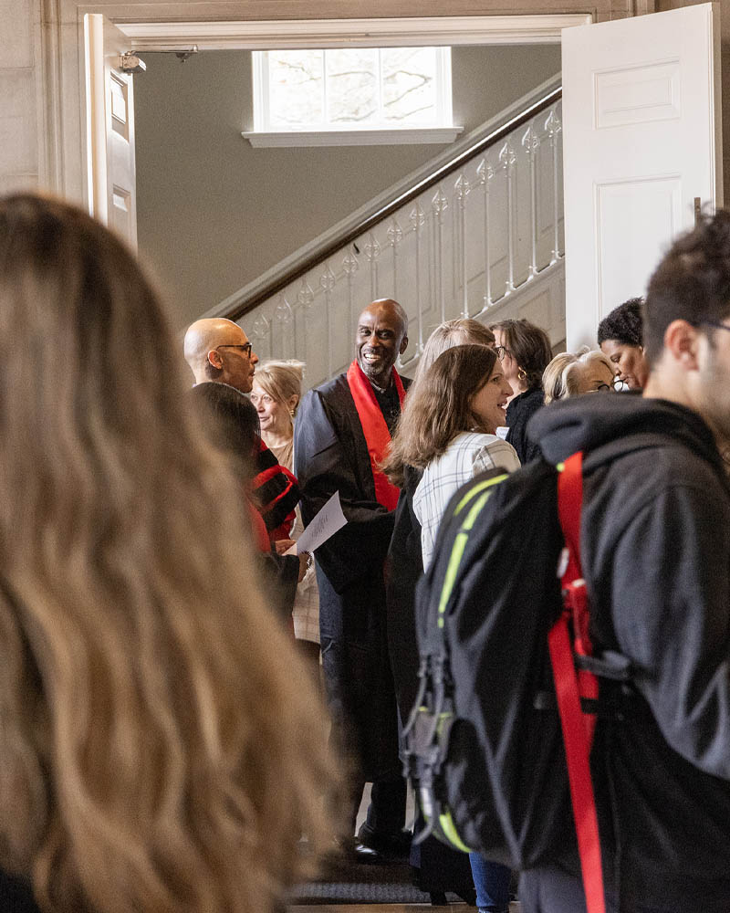 Faculty and students gathered in the Swasey Chapel lobby.