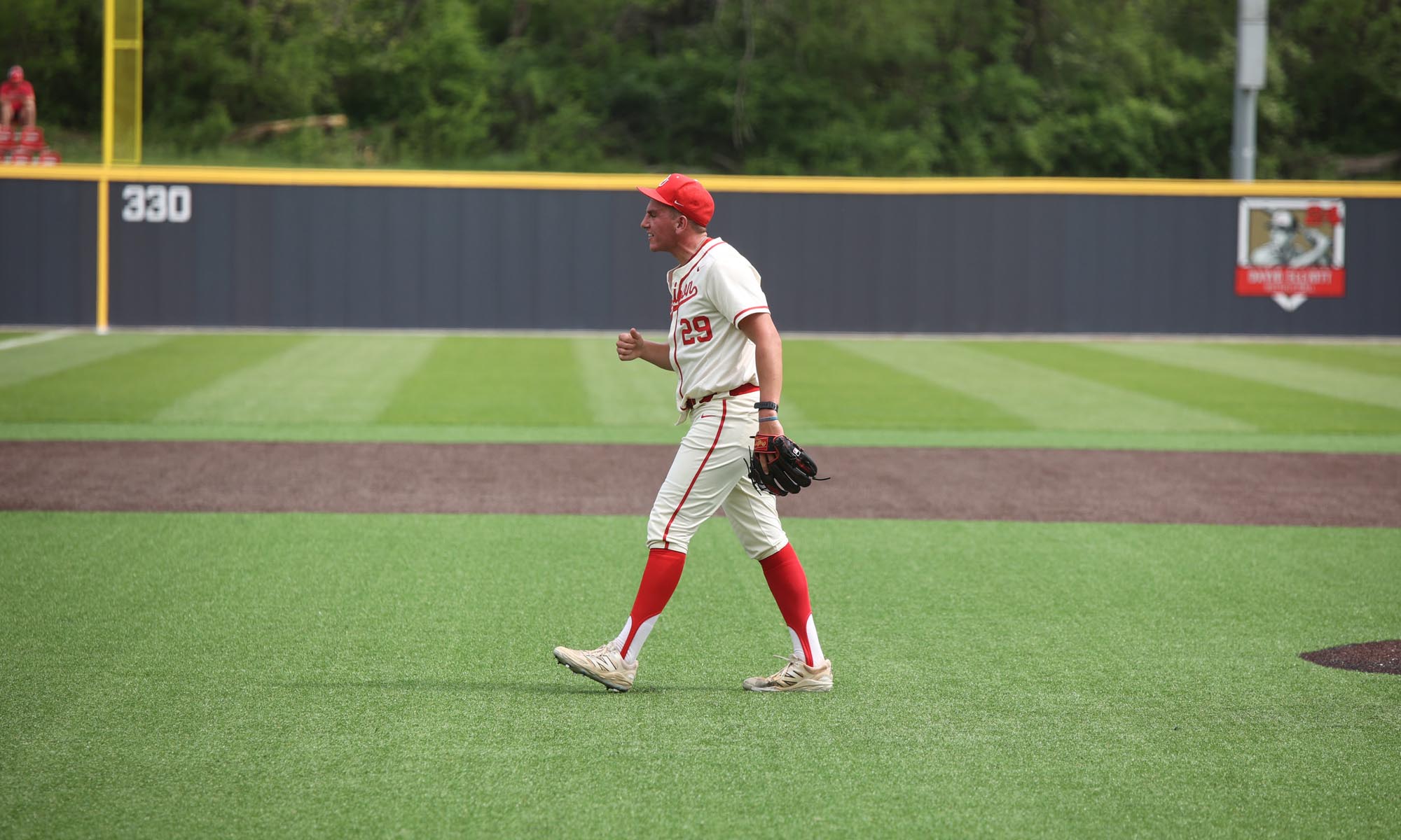 A Denison baseball player on the field.