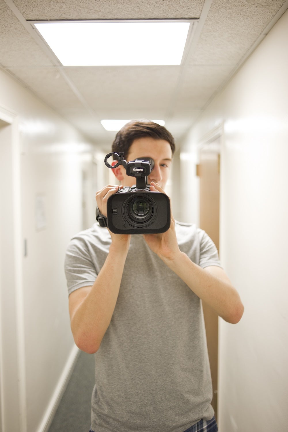 Cinema student holding a video camera