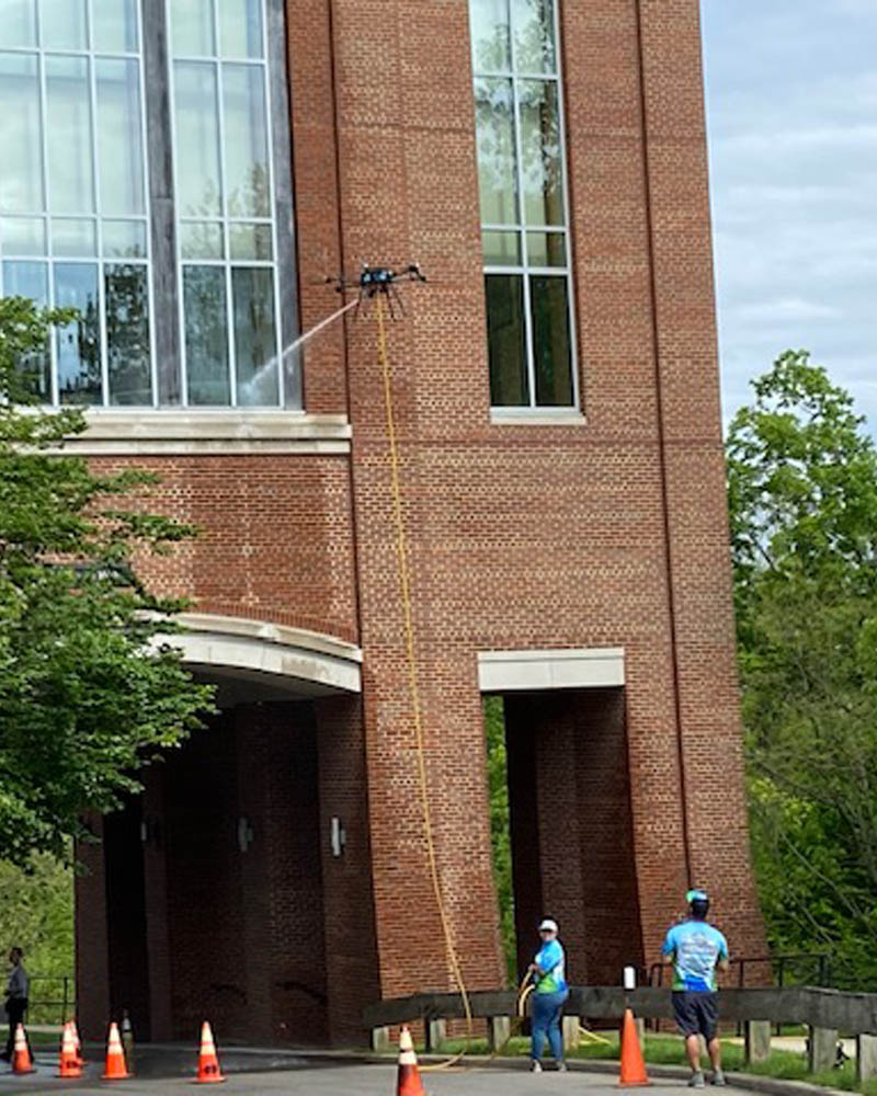 Drone power washing.