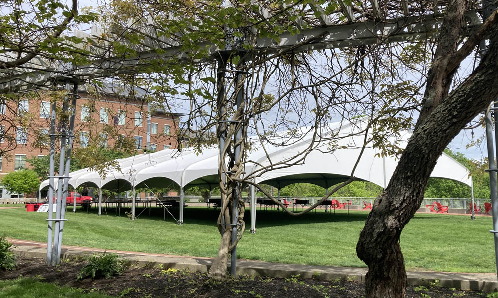 A large white event tent set up on Reese~Shackelford Common.