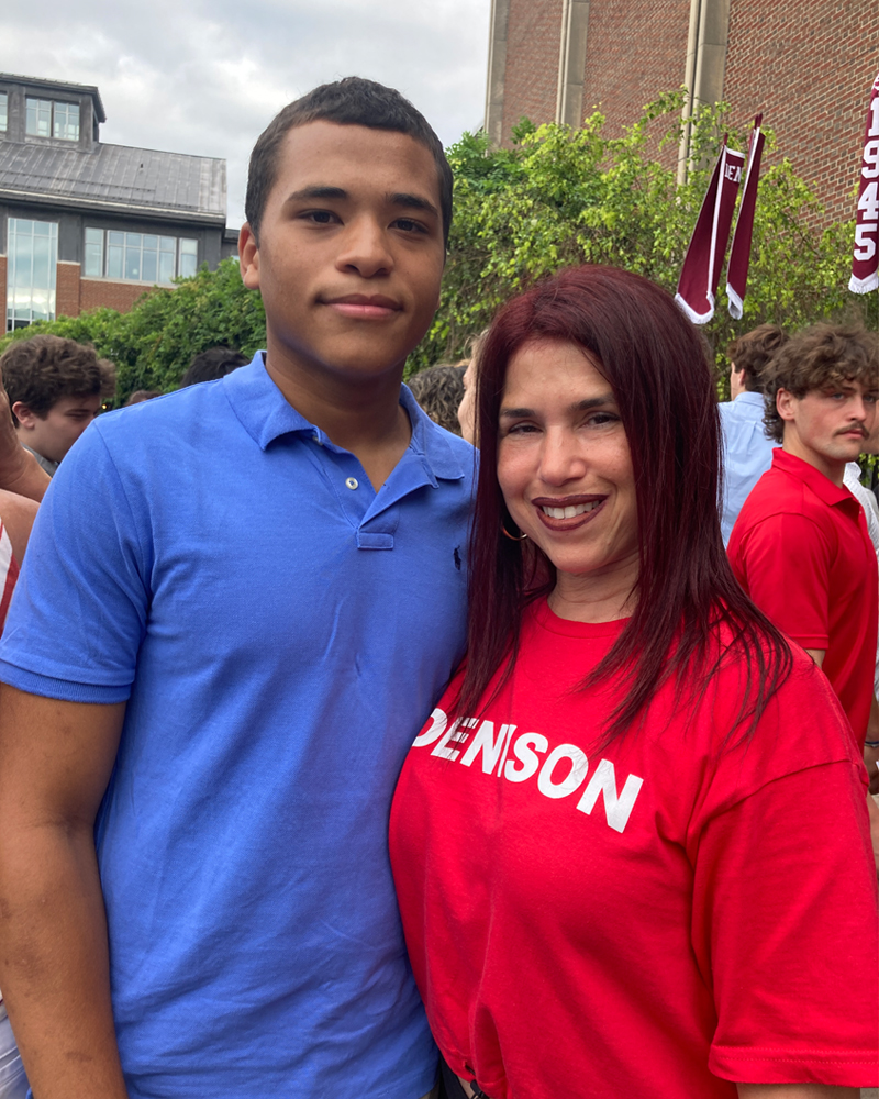 Photo of a first-year student posing with him mother after the Induction ceremony.
