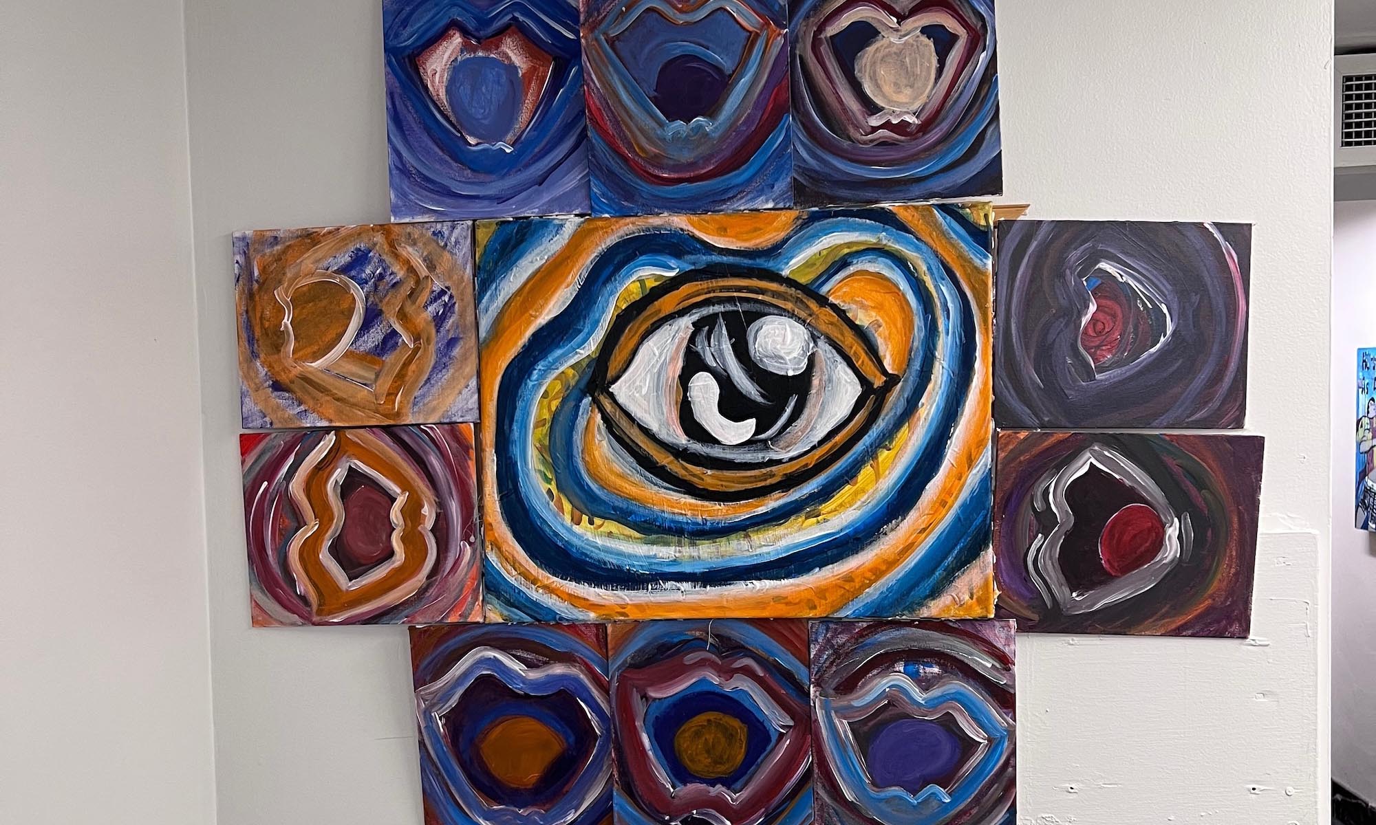 Art displayed on a wall in the Denison Libraries.