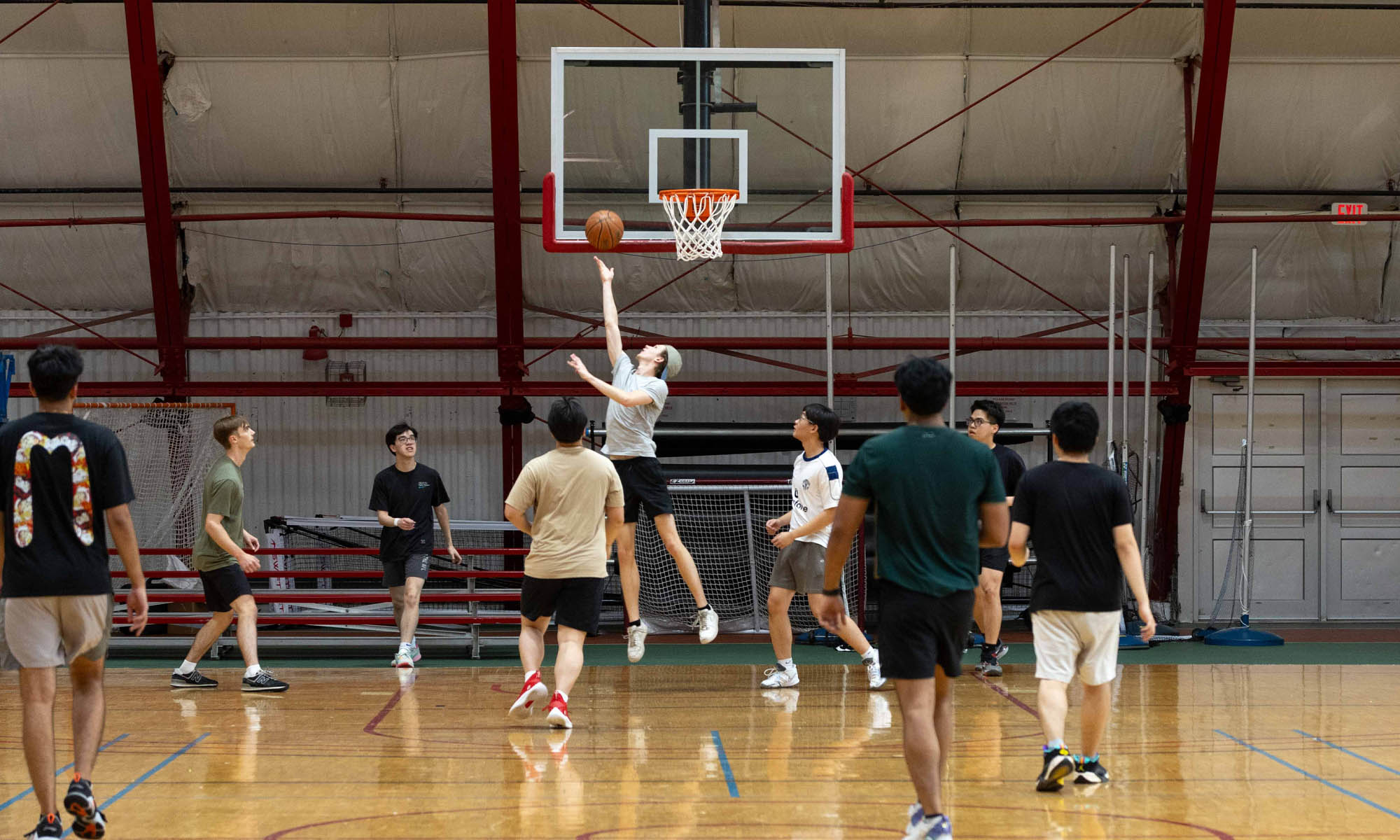 Student play basketball