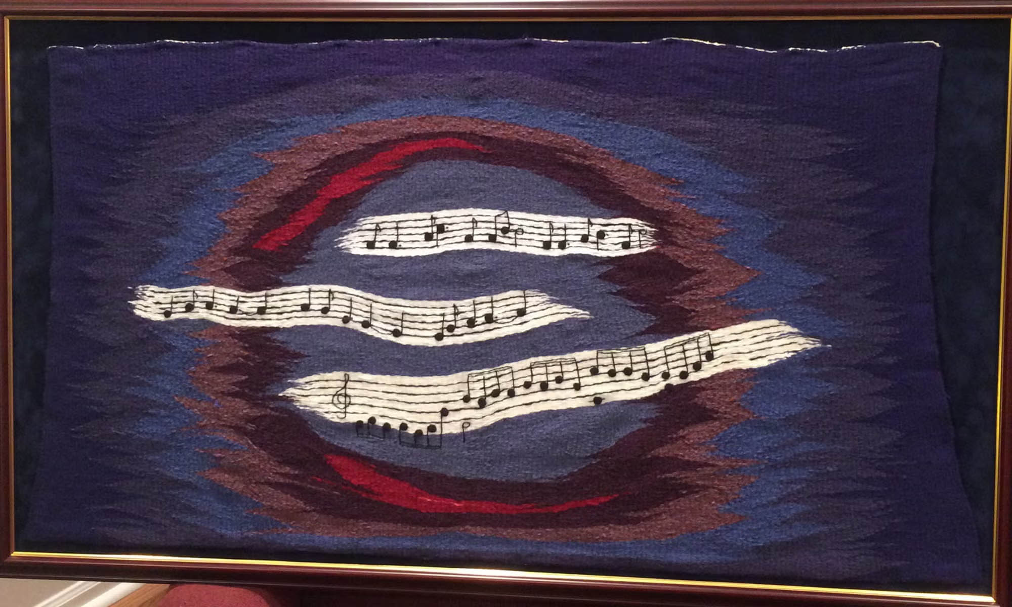 Tapestry in honor of his late wife Susan Murdock featuring three of her favorite pieces of music.