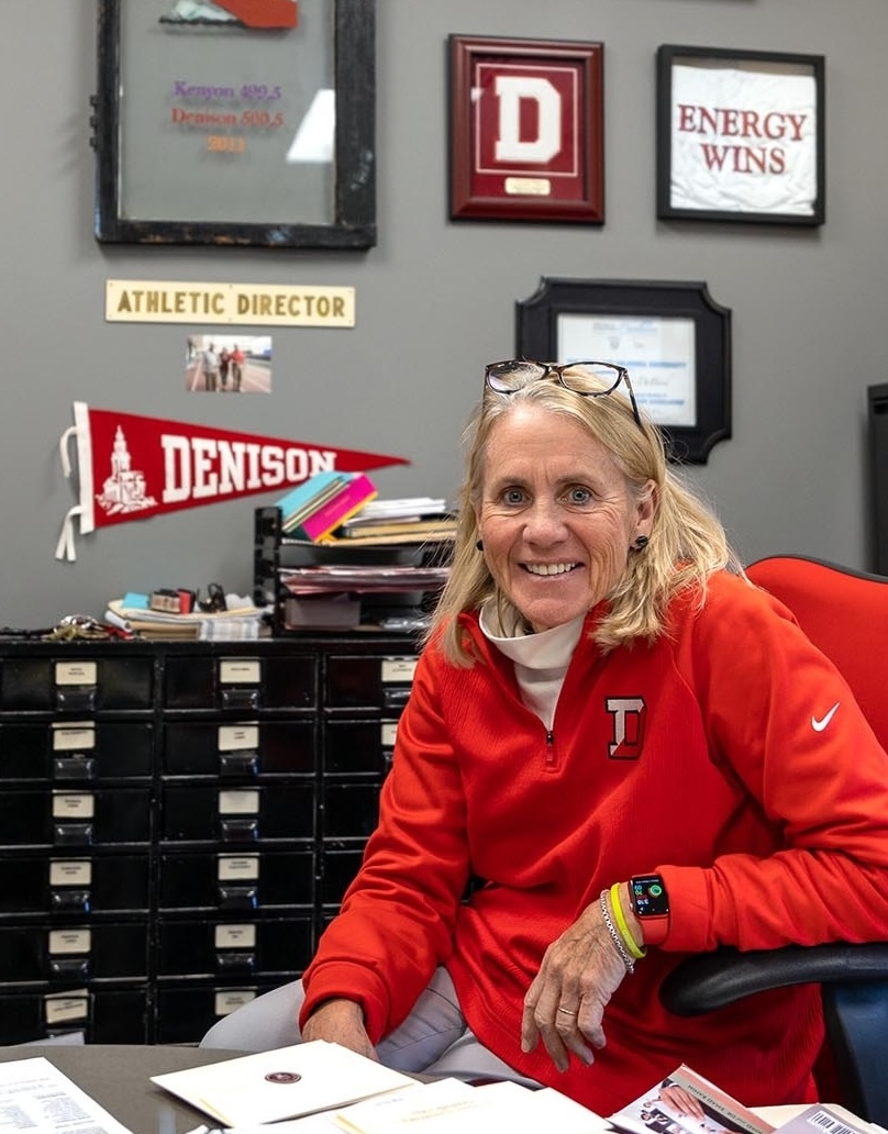 Nan Carney-DeBord ’80 poses in her office
