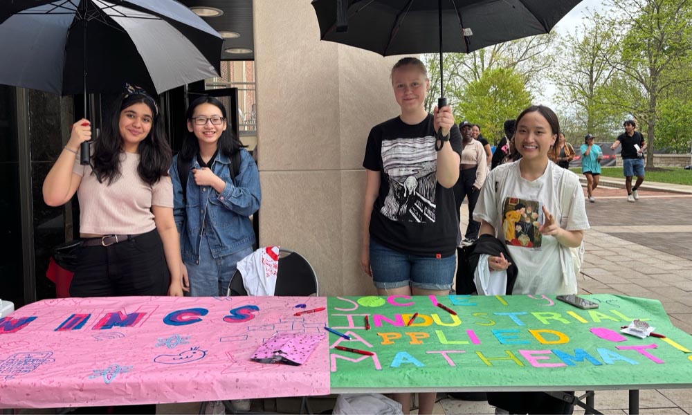 Students promoting SIAM at an involvement fair.