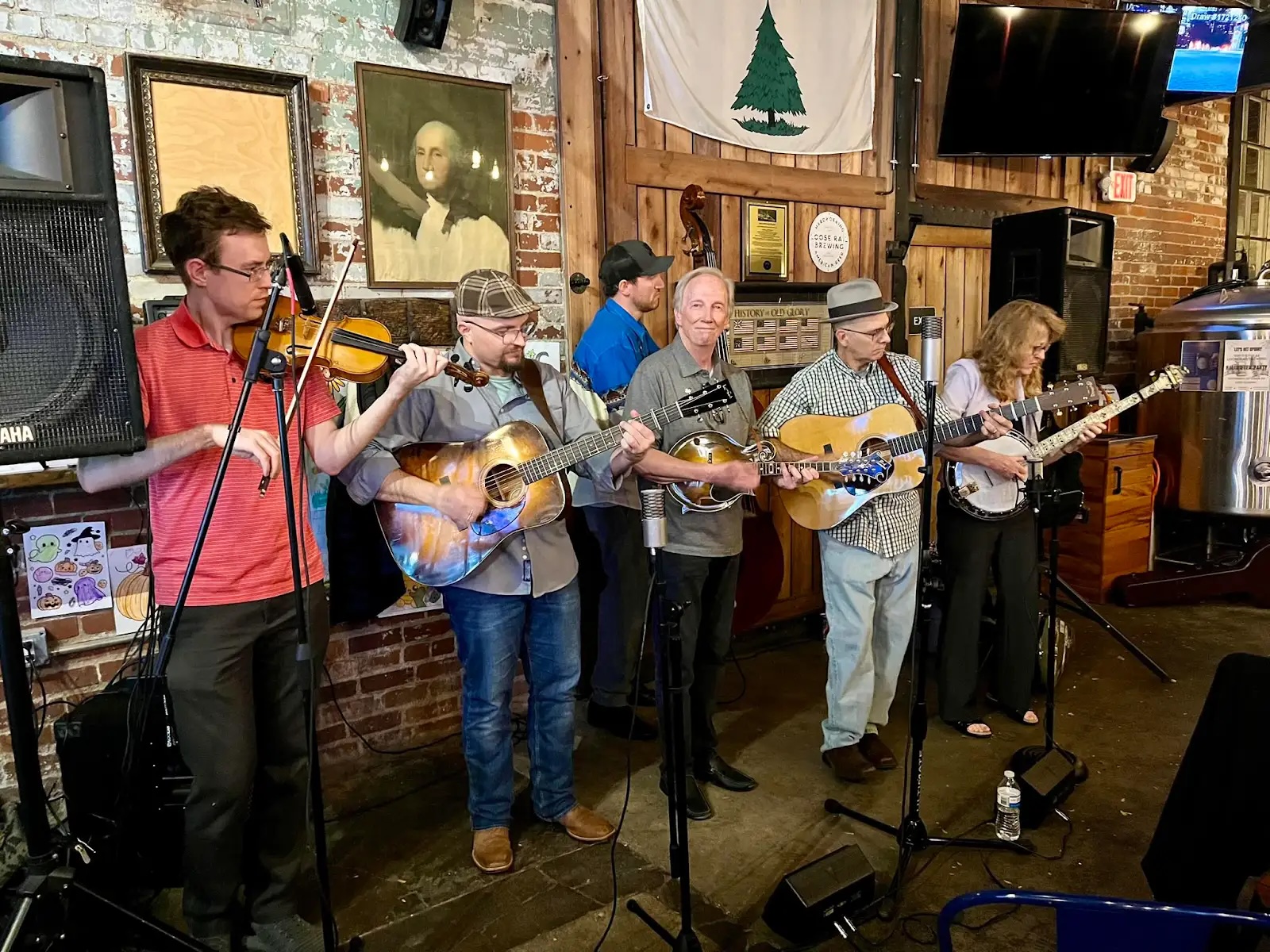 Rich Baker (center) with his band
