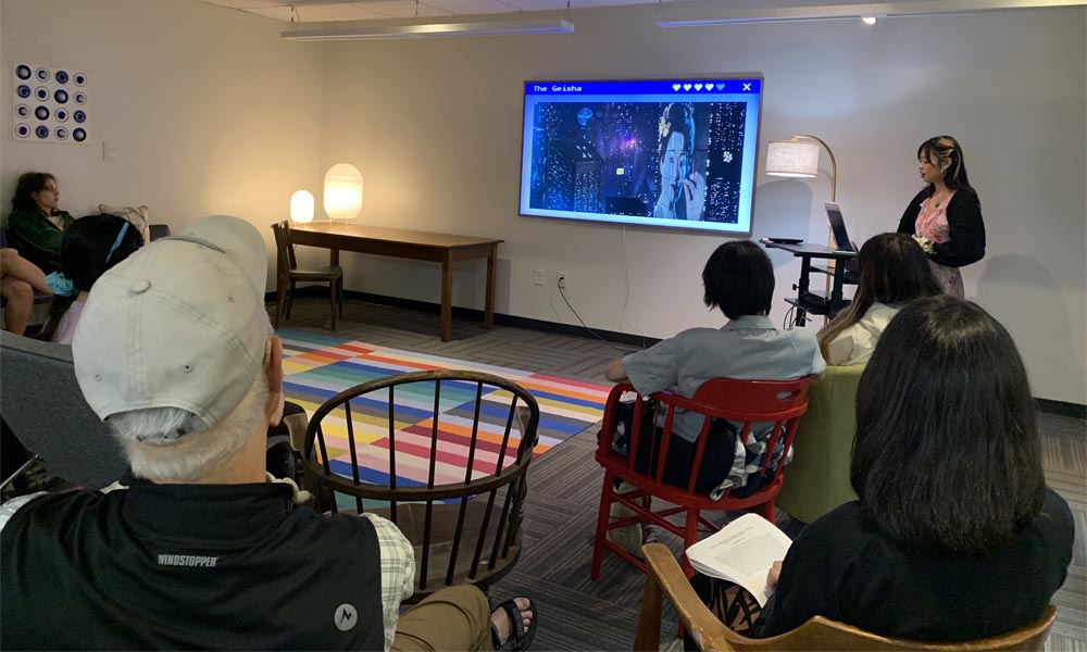 Photo of a student giving a presentation.