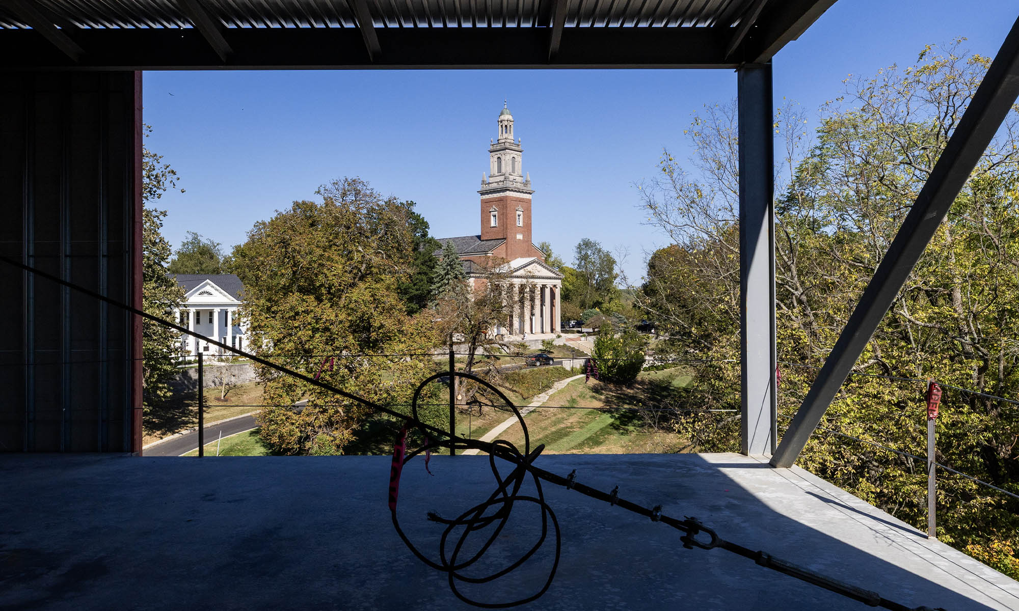 A chapel framed by construction girders.