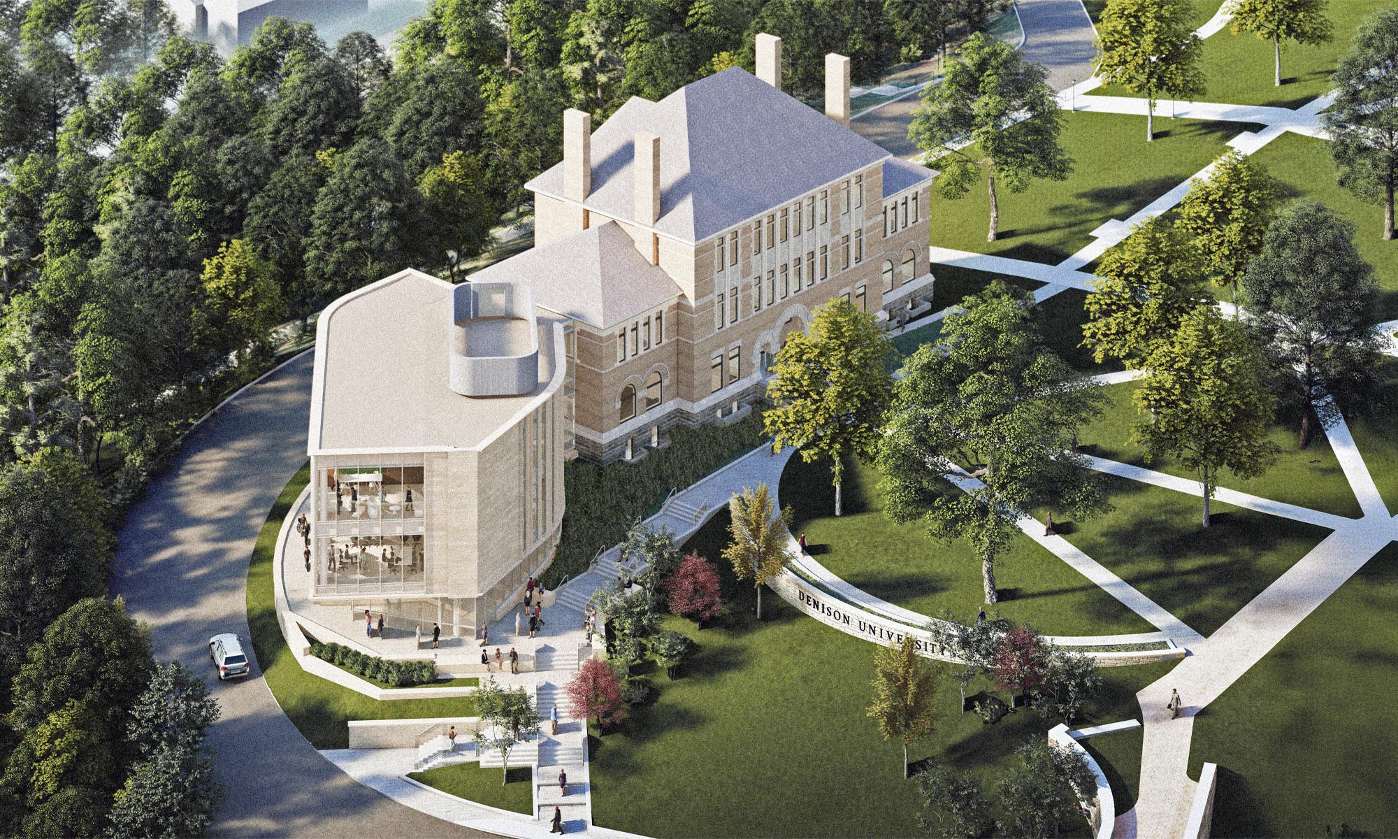 A large brick building with multiple chimneys is surrounded by trees, green lawns, and paved walkways, with parked cars and a curved driveway visible nearby.