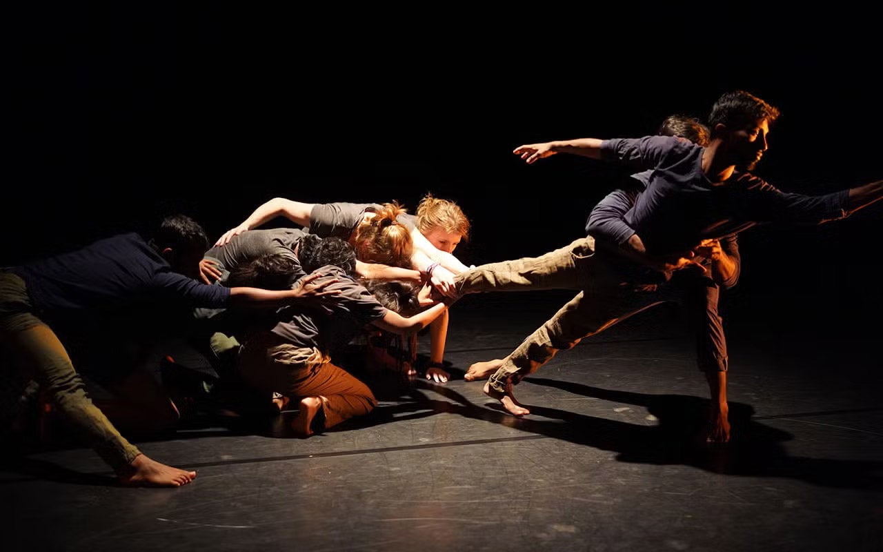 Denison students perform on stage.