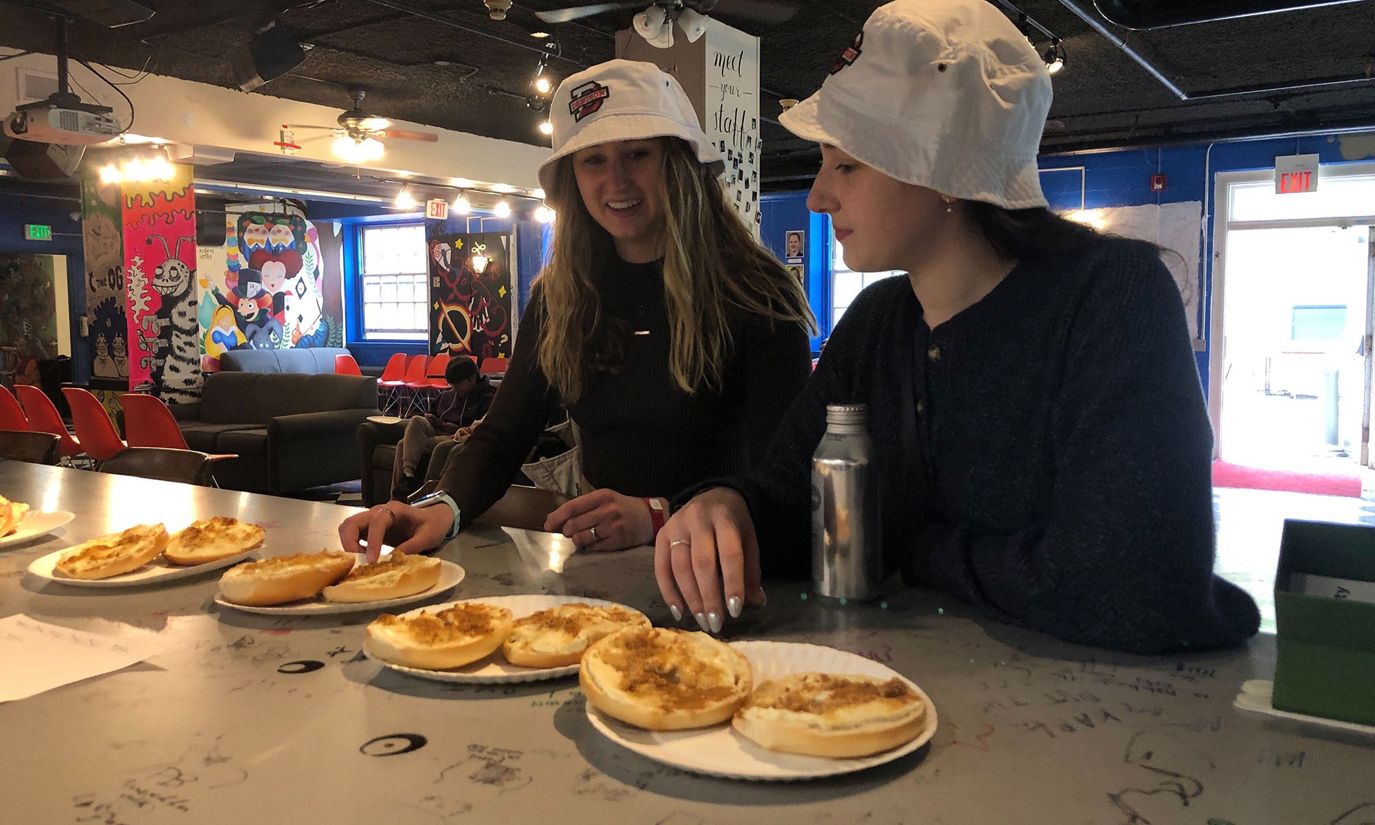 Denison seniors peruse their snagel options at the Bandersnatch counter on the Denison campus.