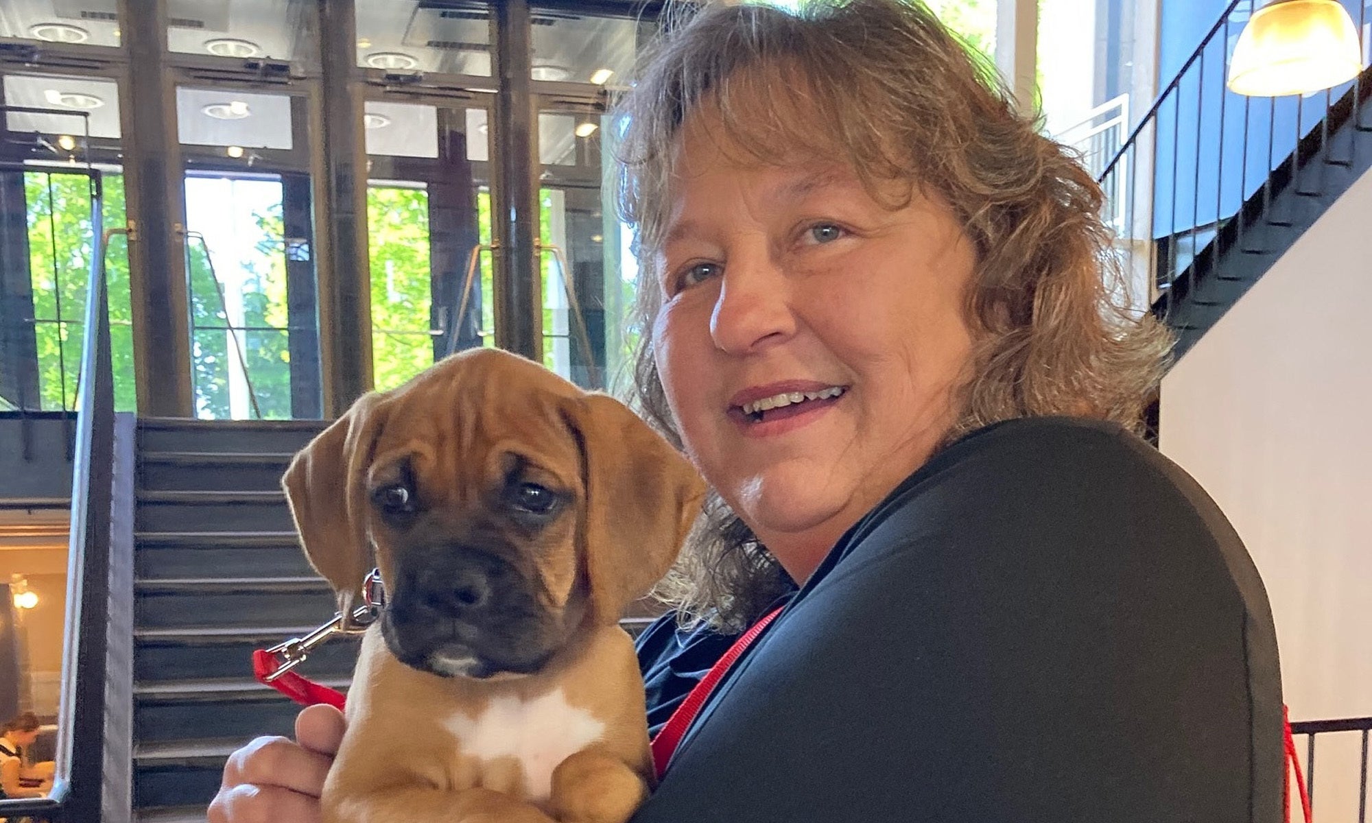 Chief the 8-week-old boxer pup pays a visit to Denison's Slayter Union.