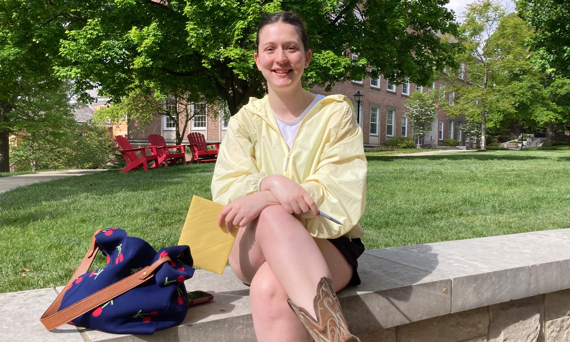 Kate McNabb ’26 pauses on Denison's A-Quad at the start of a busy day.