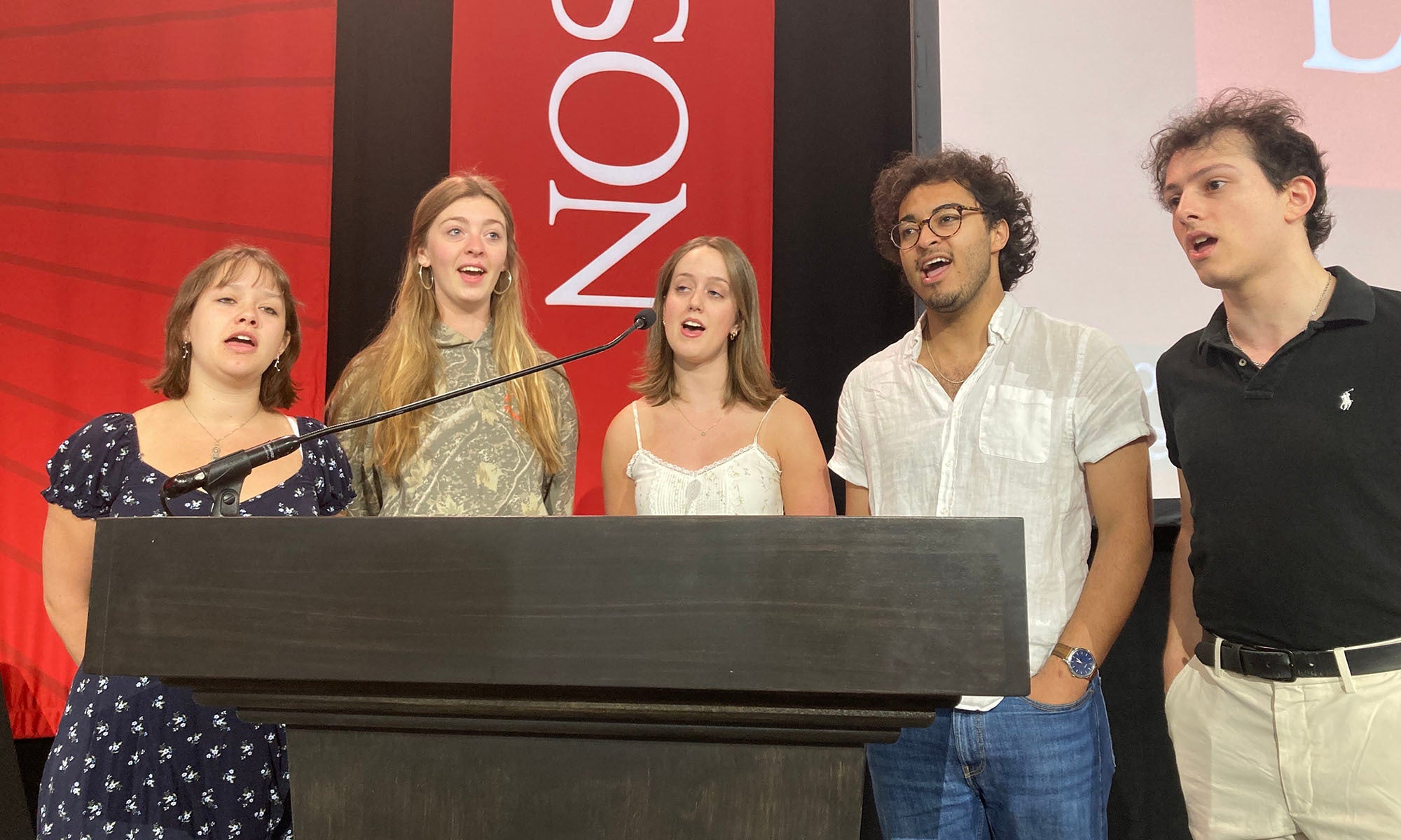 Denison students rehearse the singing of their alma mater on the morning before Commencement.