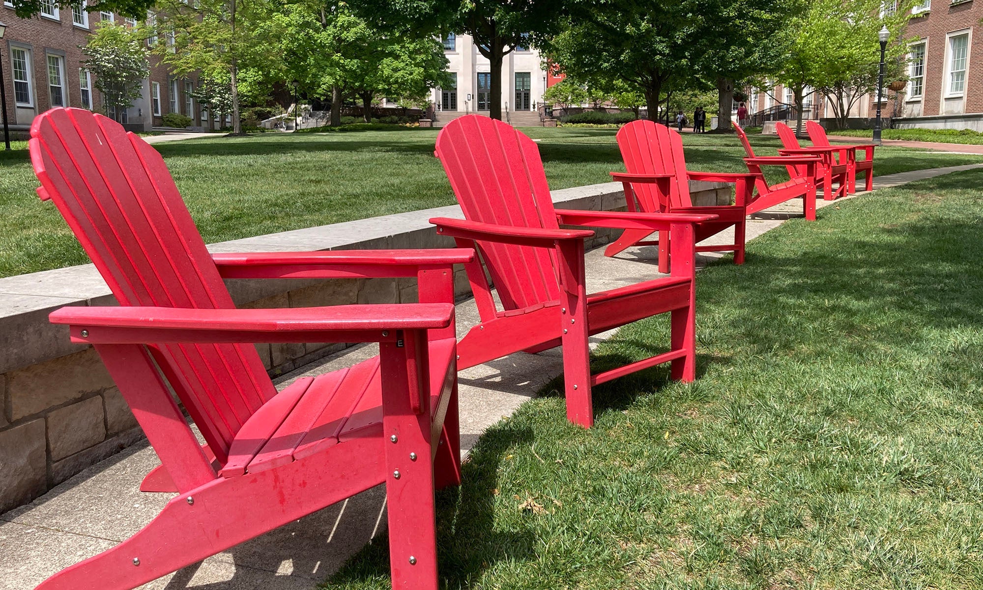 Adirondack chairs line Denison's A-Quad on a quiet day before Commencement.