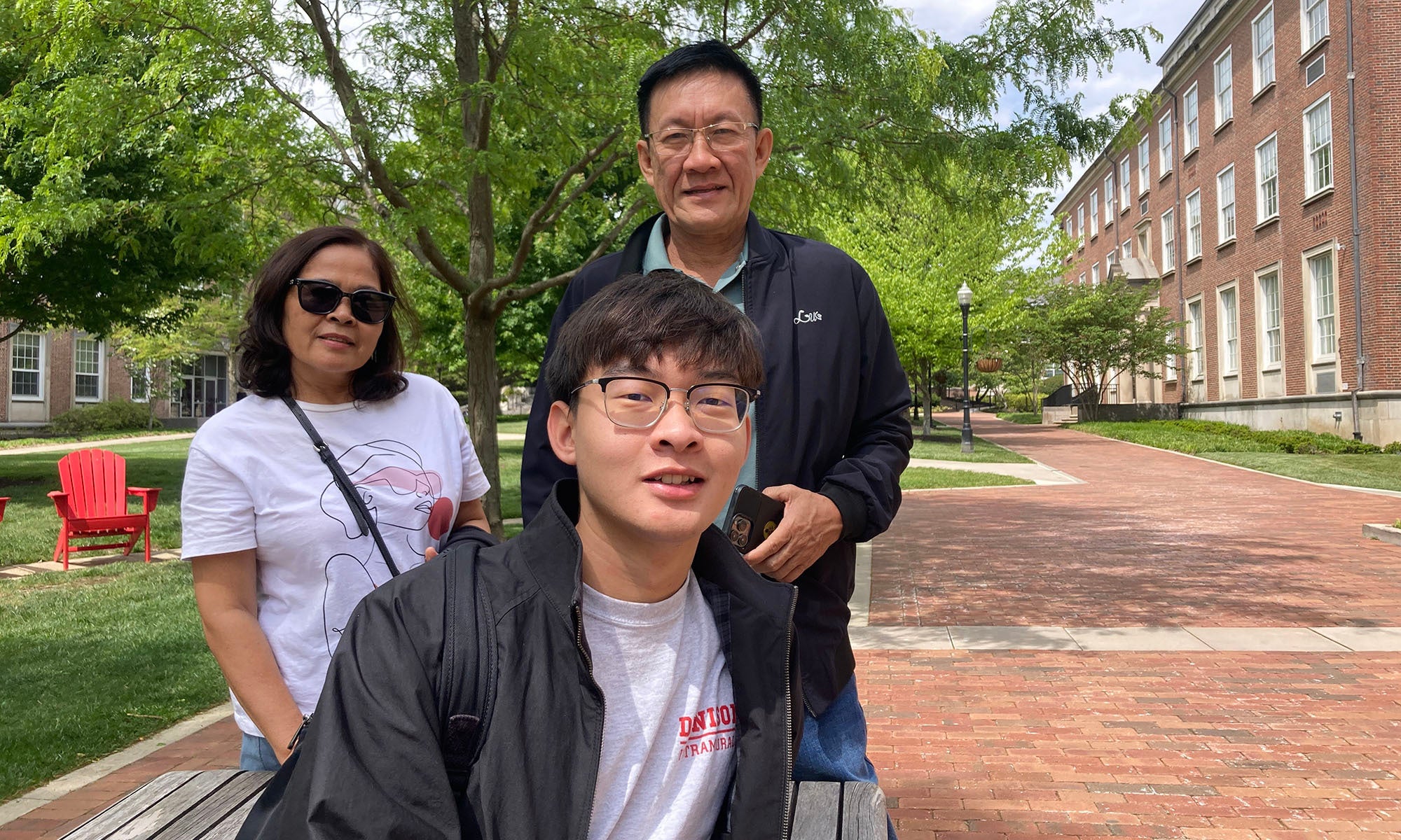 A Denison senior shows his parents around campus on the day before Commencement.