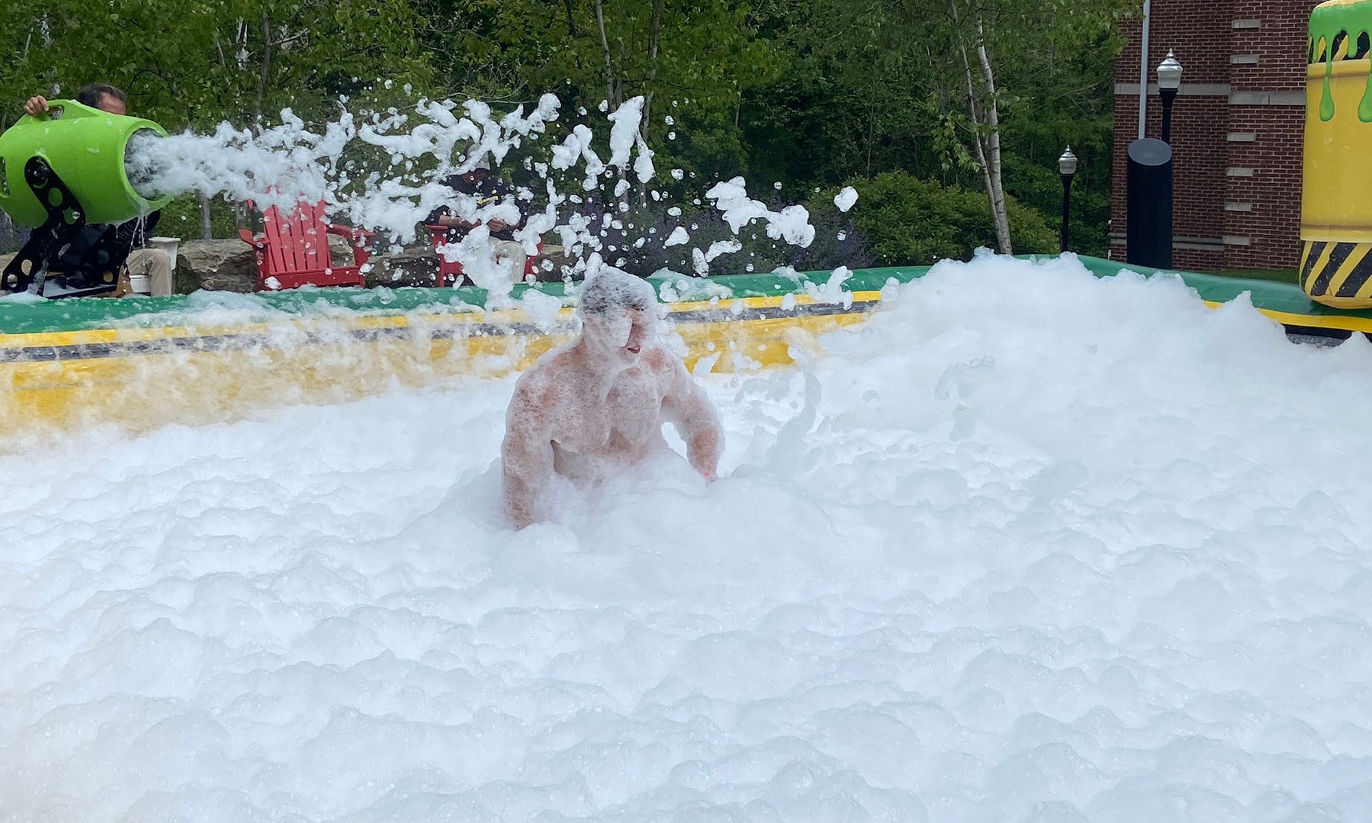 Guy covered in foam