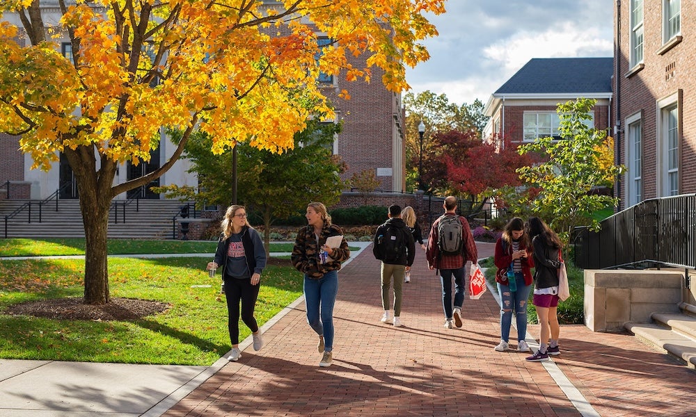 Students walk across the A-quad