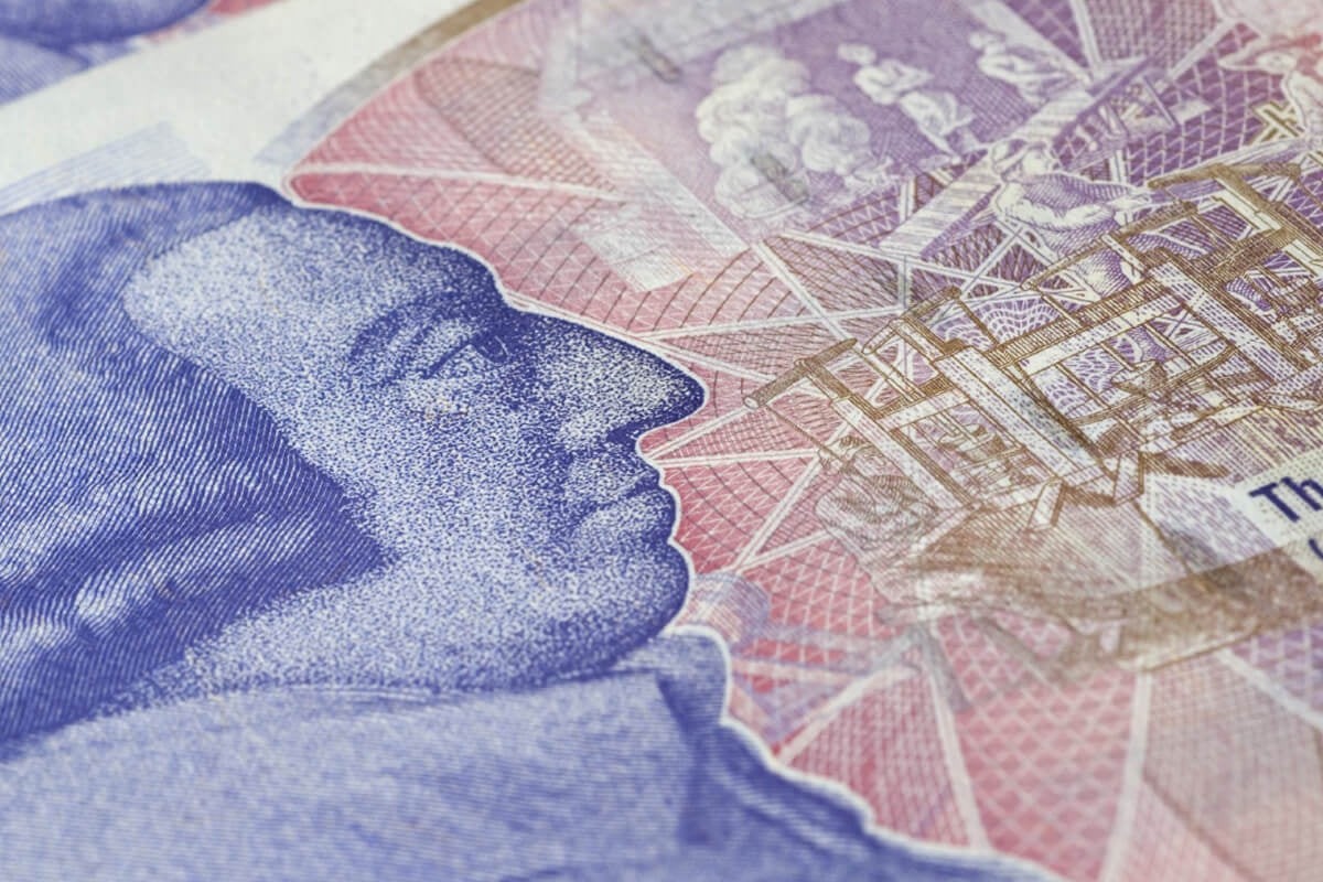 Closeup of a man's face printed on a piece of paper