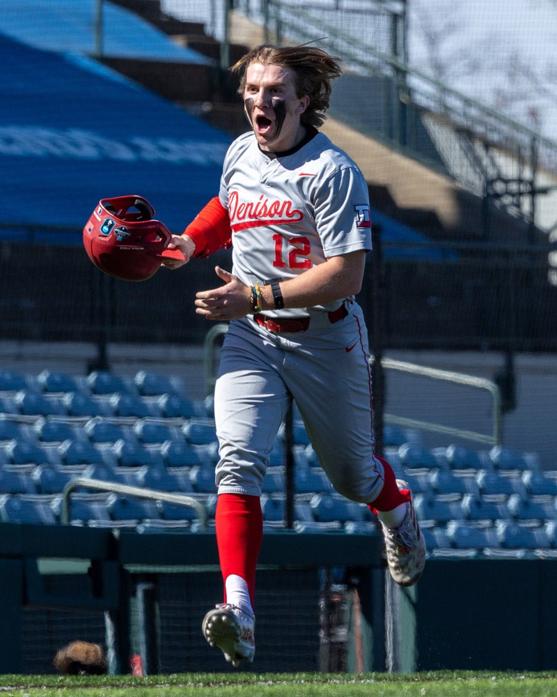 A baseball player running the bases.