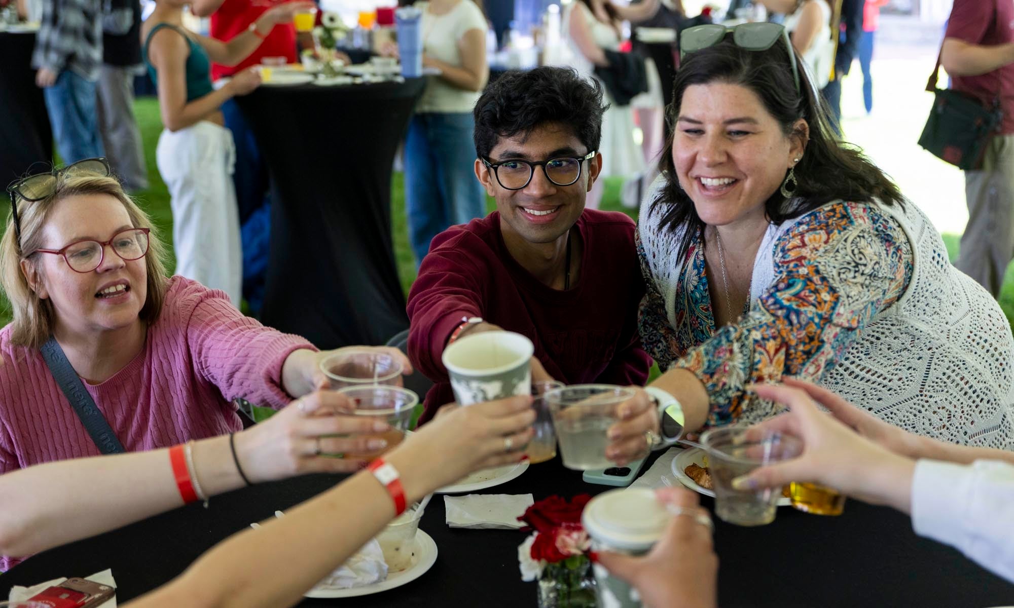 Several graduating seniors toast their success. 