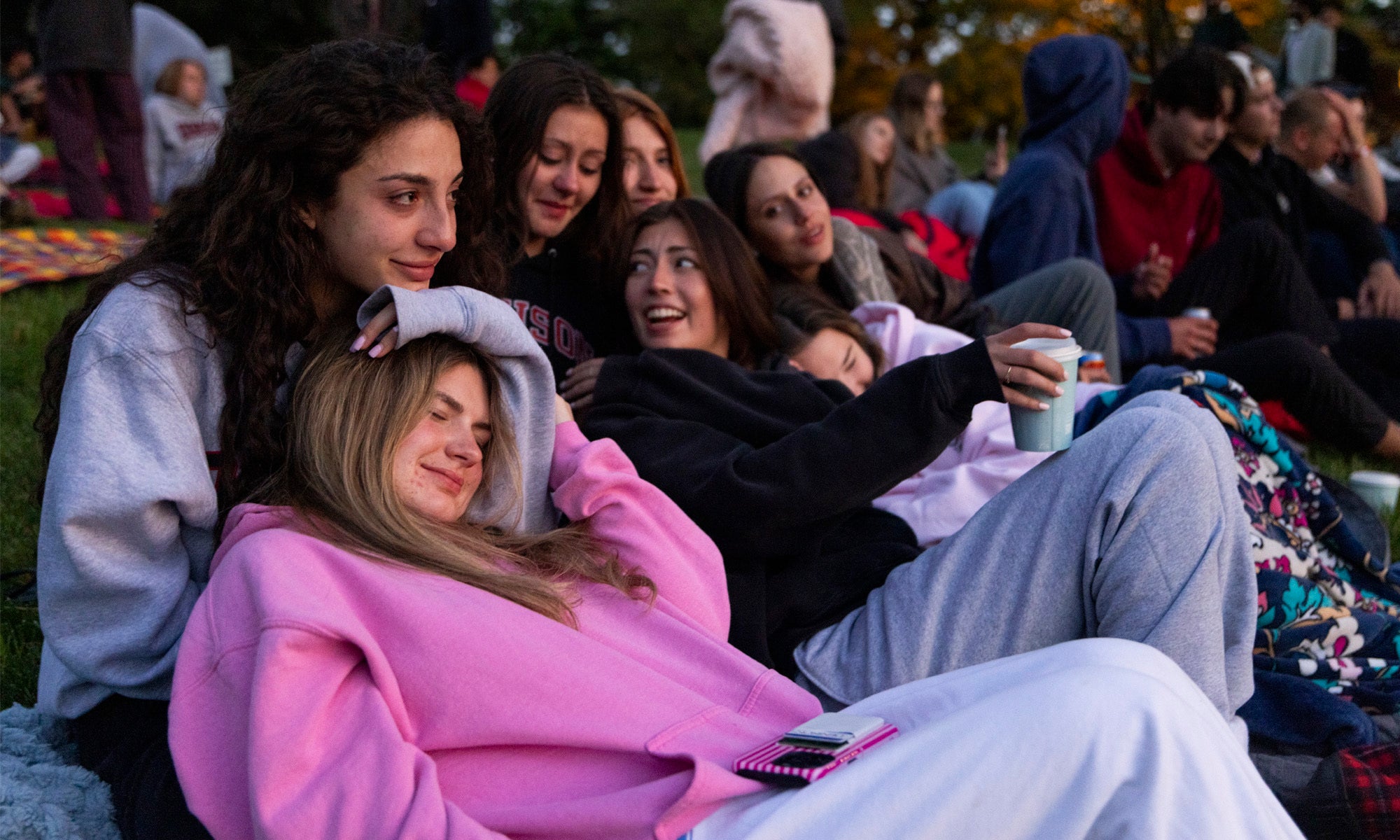 Seniors watch the sun rise over Denison University.