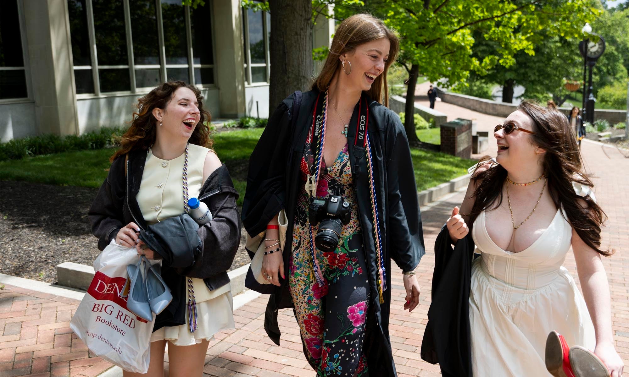 Three Denison seniors cross A-Quad on their way to Doane Library.