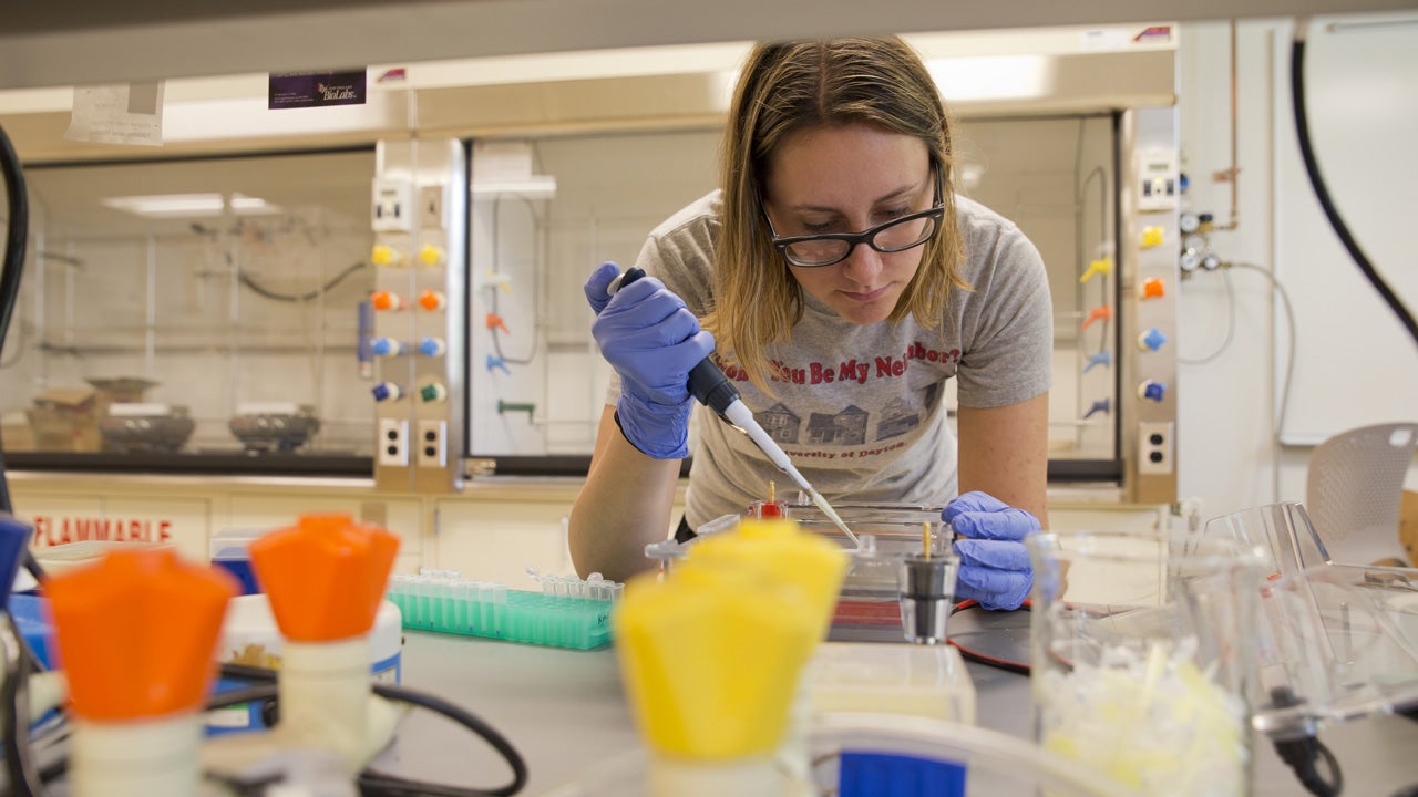 Student looking at lab equipment
