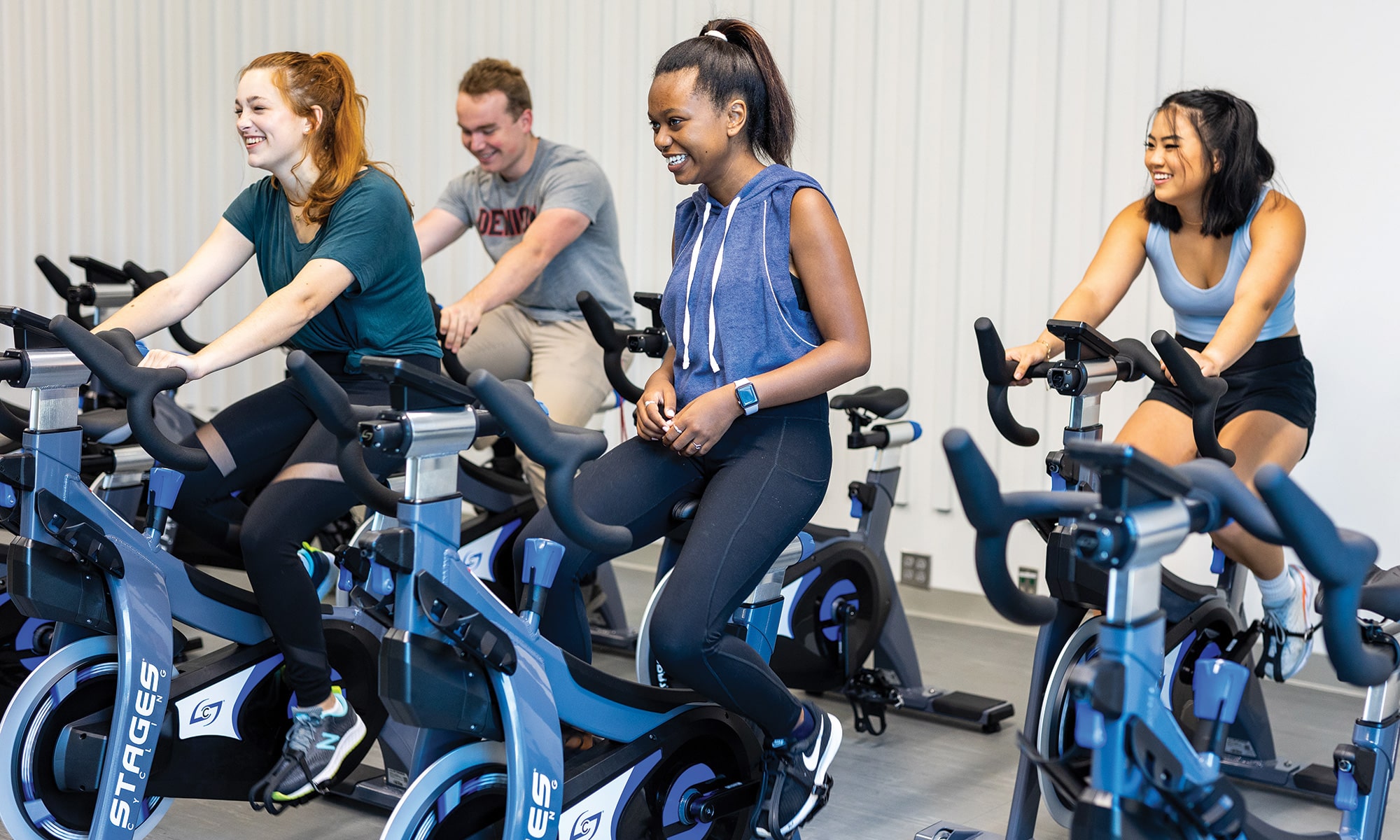 Students cycling at the wellness center