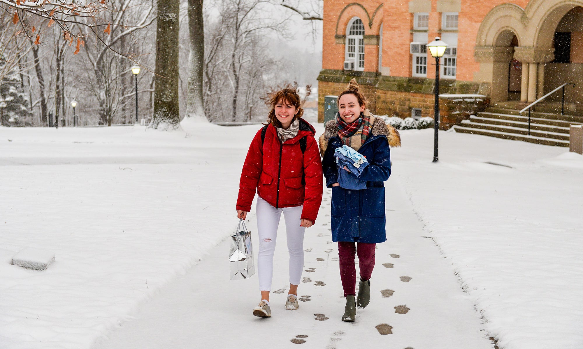 Students walking around campus in the snow