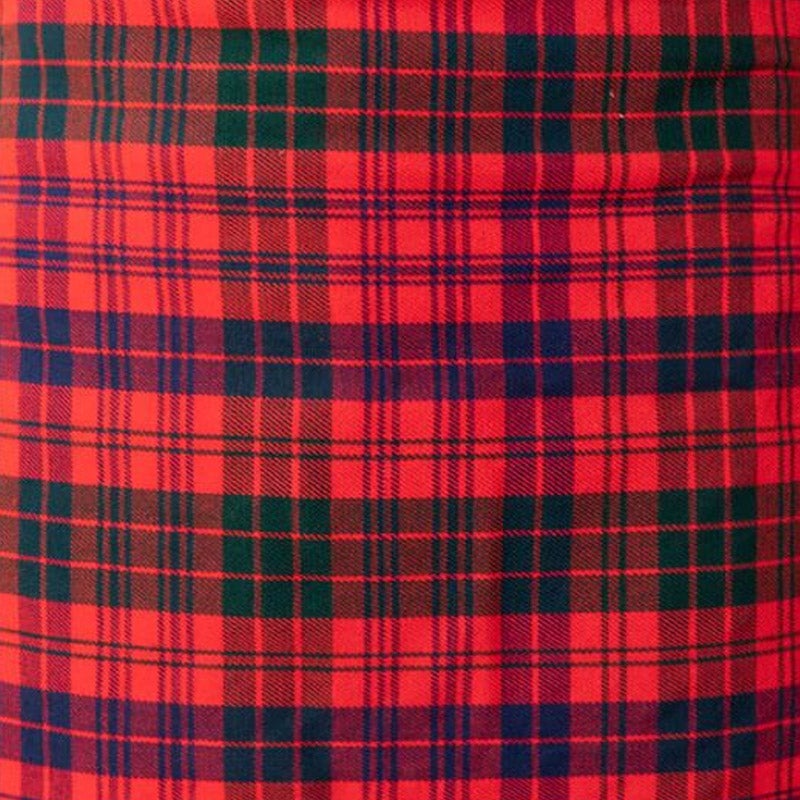 Red tartan fabric with intersecting horizontal and vertical stripes of green and blue, forming a repeating checkered pattern.