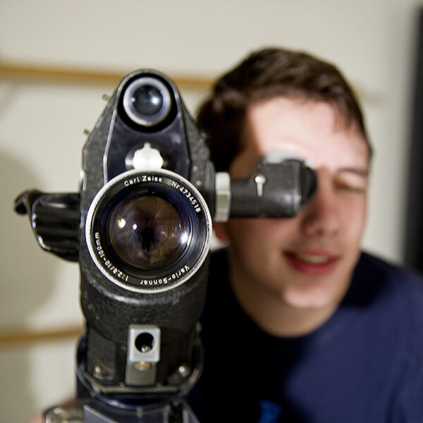 student with camera