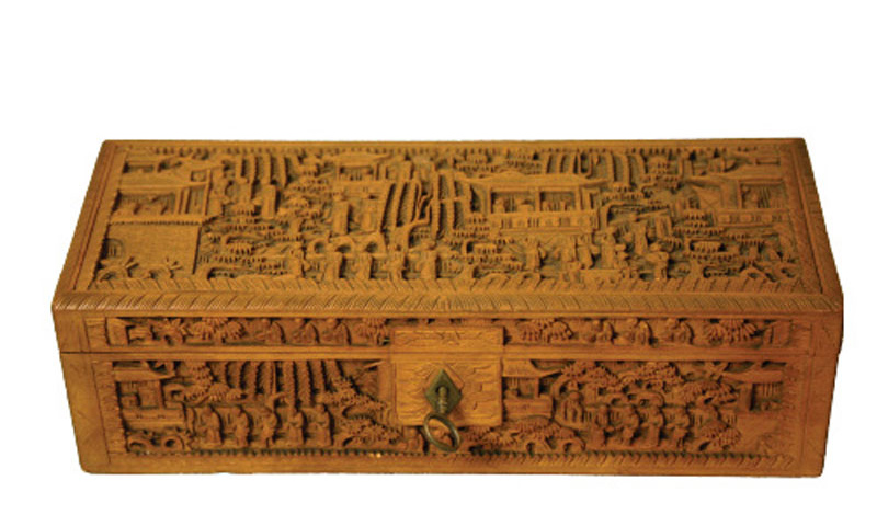 Wooden box with engravings