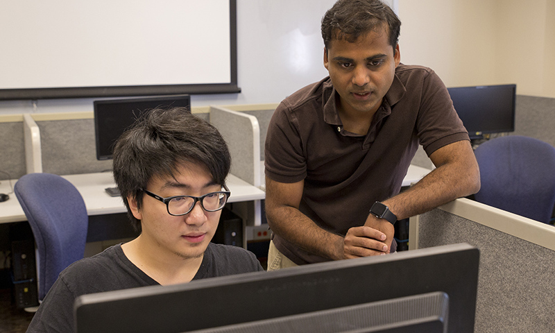 Student Junbo (Larry) Li with professor Ashwin Lall