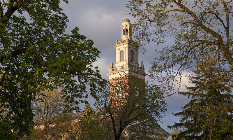 Image of Swasey Chapel, with trees framing the view