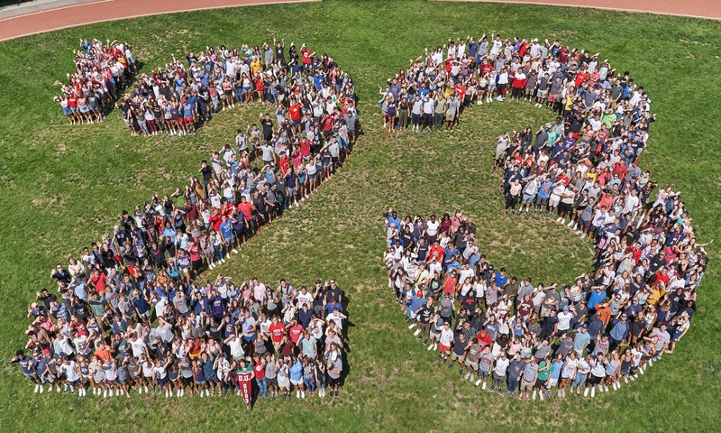 Class of 2023 in the shape of 23 on a lawn