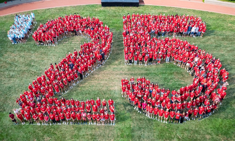 Aerial photo of the Class of 2025 forming a large "'25" on Reese~Shackelford Common